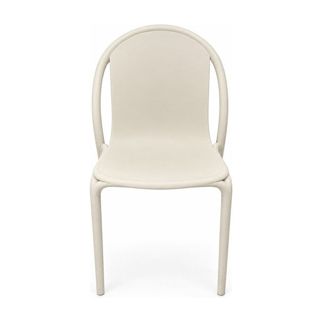 Beige dining chair with a continuous molded shell by Vondom