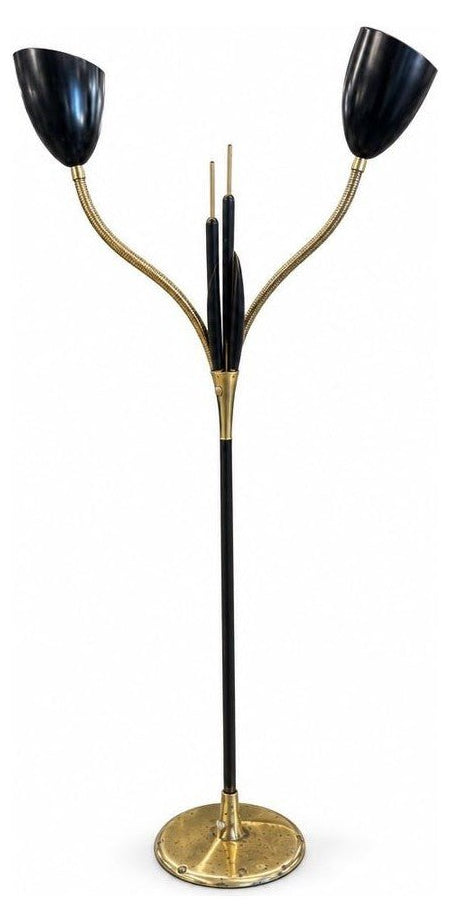 Black and brass vintage cattail double floor lamp with two slender metal stems.