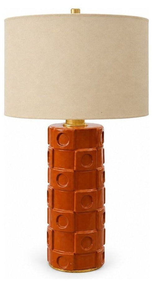 Burnt orange ceramic table lamp with a tapered mid-century body.
