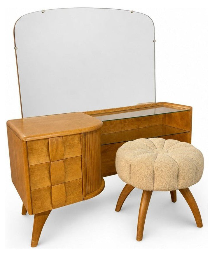 Walnut Heywood Wakefield vanity desk with sliding tambour doors and a worn desktop.