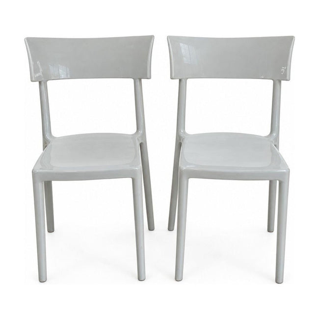 Light gray dining chairs with a single molded Catwalk shell by Kartell