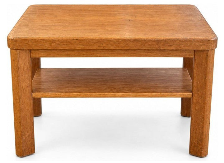 Honey oak end table in solid wood with a warm light grain and a simple rectangular top.