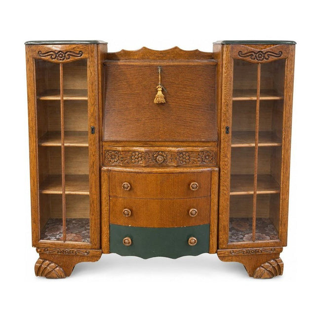 Natural wood secretary desk with tall slim proportions and drop-front silhouette.