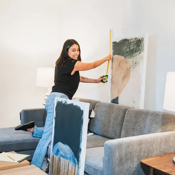 A friendly staff member at What’s New Furniture in Portland, helping customers find new, used, and consigned furniture.
