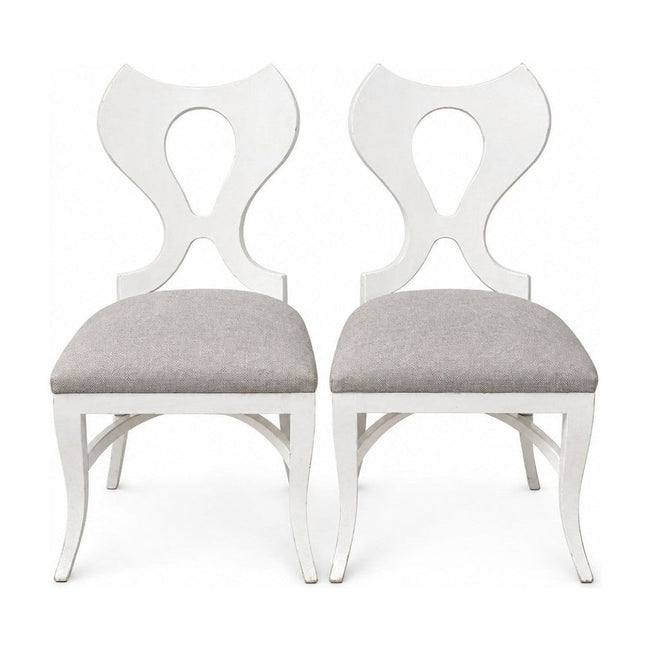 White dining chairs sold as a matching set of two with clean contemporary lines.
