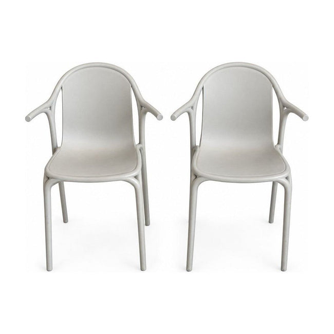 Light Gray geometric dining chairs with a pixel-cut molded shell by Vondom