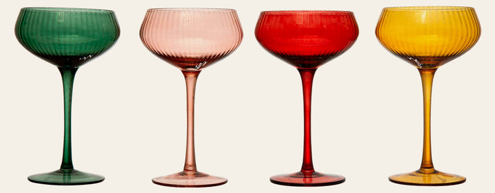 Fluted Stemmed Coupe Glasses in all four colors - emerald blush ruby and amber - by Creative Co-Op - Whats New Furniture Portland OR