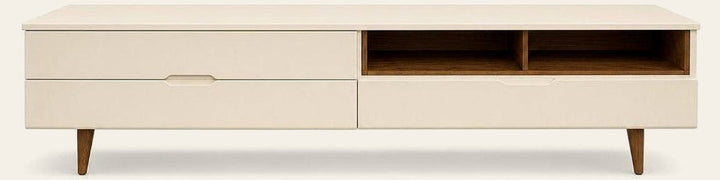 White media console table with a long slim top and marked tapered legs.