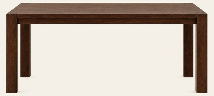 Brown Oak solid wood Terra dining table with a long rectangular top and clean contemporary lines.