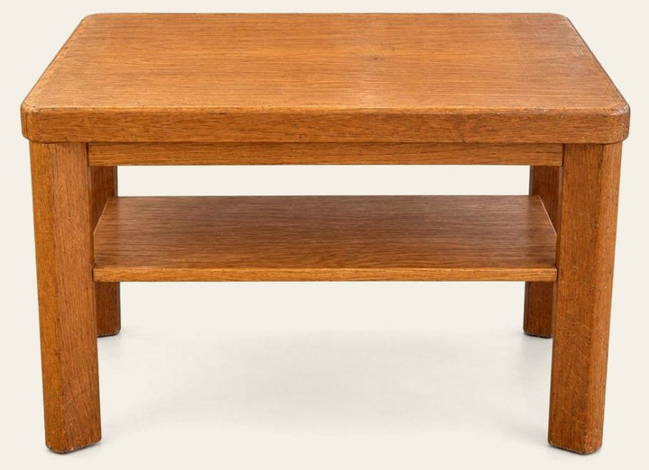 Honey oak end table in solid wood with a warm light grain and a simple rectangular top.