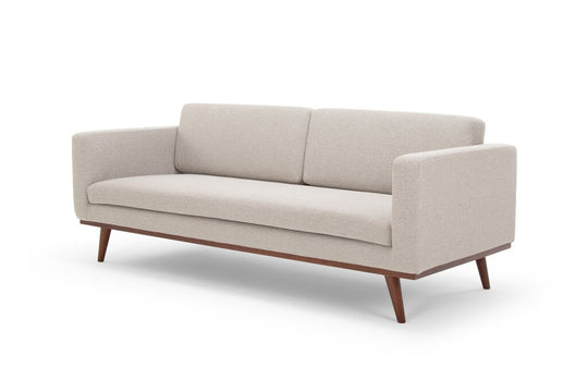 A beige Sensei Modern Sofa with a sleek contemporary design, featuring deep seating and a minimalist aesthetic.