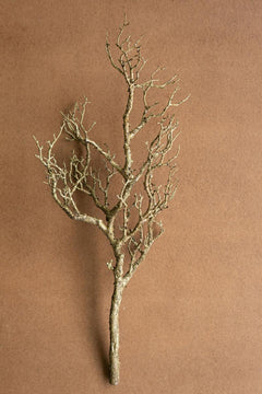 Faux bare wood branch shown from a second angle with its trunk and side twigs visible - artificial branch by Kalalou - Whats New Furniture Portland OR