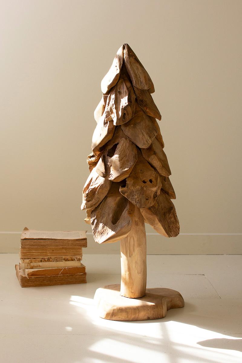 Large rustic teak Christmas tree with layered carved petals on a freeform base in a sunlit room - carved wood holiday decor by Kalalou - Whats New Furniture Portland OR