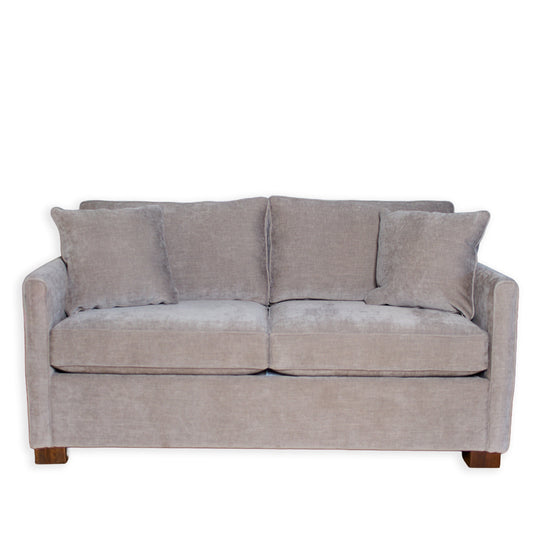 Gray sofa with four cushions on a white background
