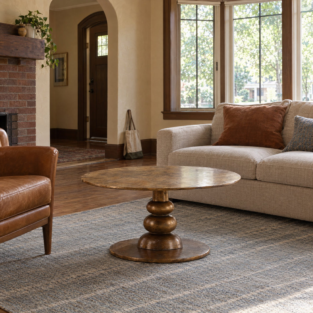 Ansari Coffee Table - Round Brass in Dark Brass styled in a Portland home - Whats New Furniture