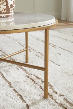 Alben Round Marble Coffee Table detail of natural marble veining against the gold frame - Whats New Furniture Portland OR