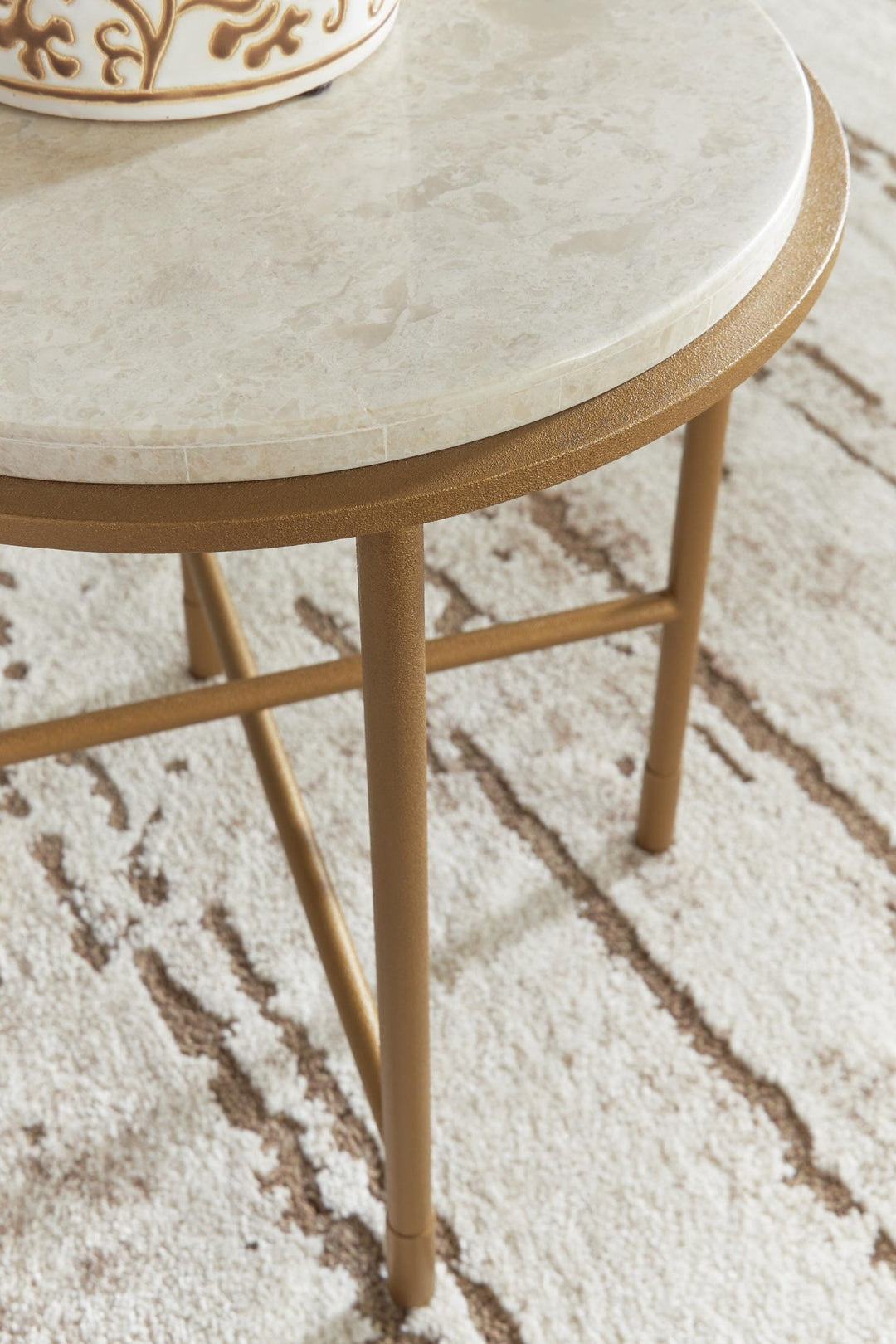 Alben Round Marble End Table detail of the natural marble veining and gold frame - Whats New Furniture Portland OR