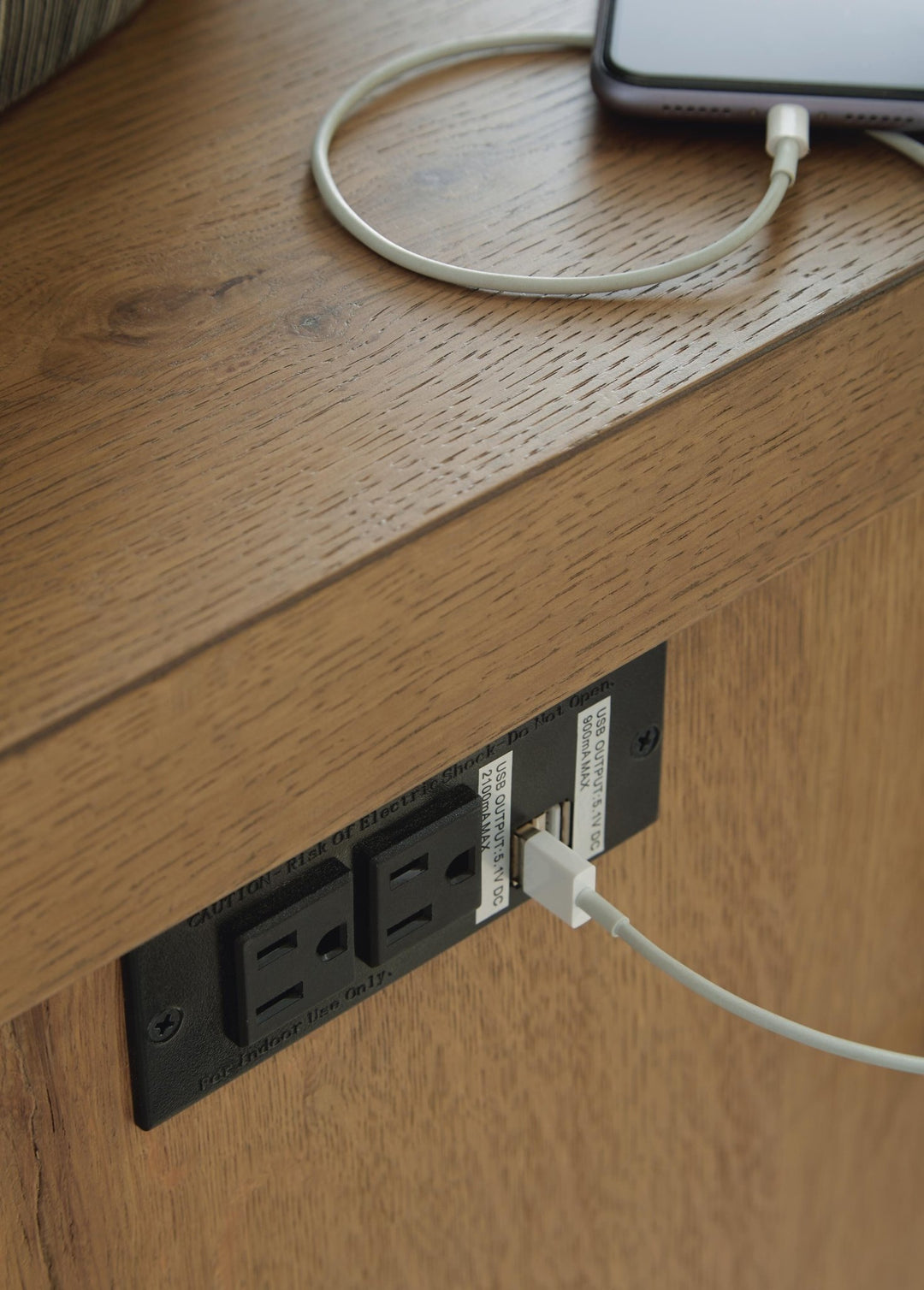 Brinstead Chairside End Table detail of the built-in outlet and dual USB charging ports - Whats New Furniture Portland OR