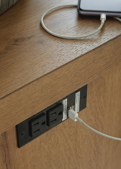 Brinstead Chairside End Table detail of the built-in outlet and dual USB charging ports - Whats New Furniture Portland OR