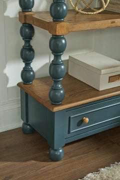 Finnworth Bookcase detail of the wood drawer pull and blue turned-spindle column - Whats New Furniture Portland OR