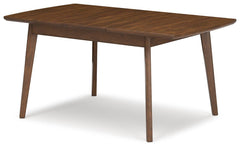 Lyncott Extension Dining Table angled view showing the tapered legs - Whats New Furniture Portland OR