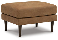 Telora Ottoman in caramel faux leather angled view showing the accent legs - Whats New Furniture Portland OR