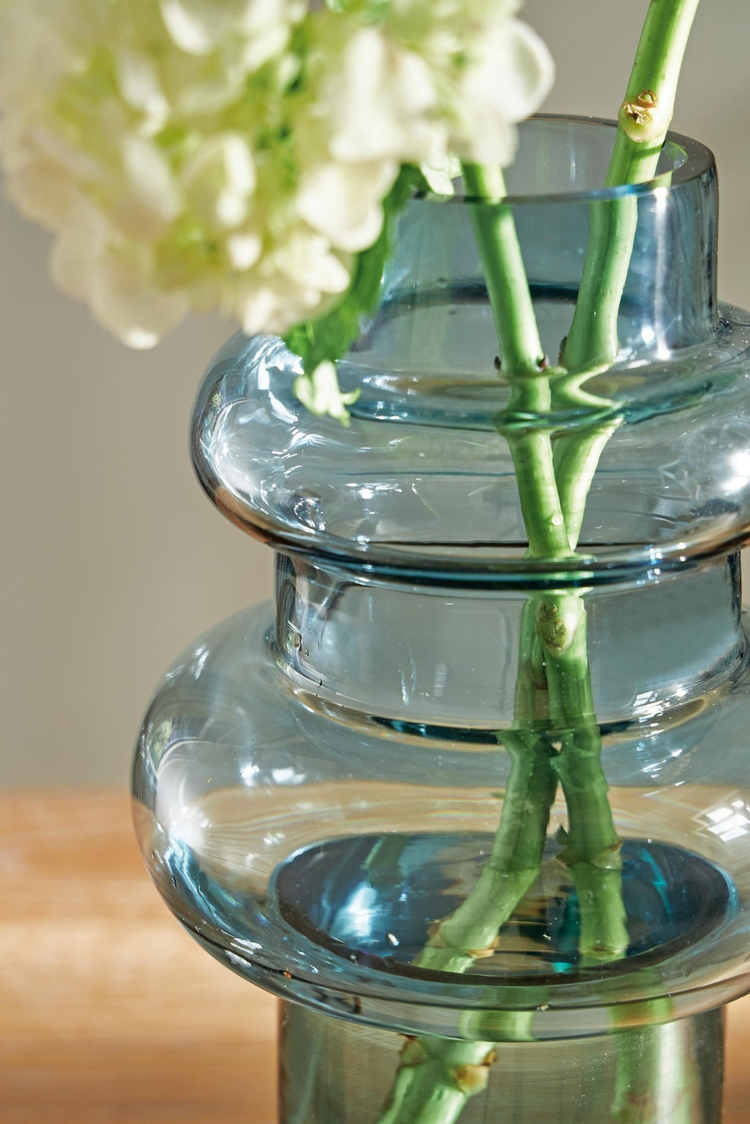Vallmen 10-Inch Vase in Blue — Ashley Furniture detail view