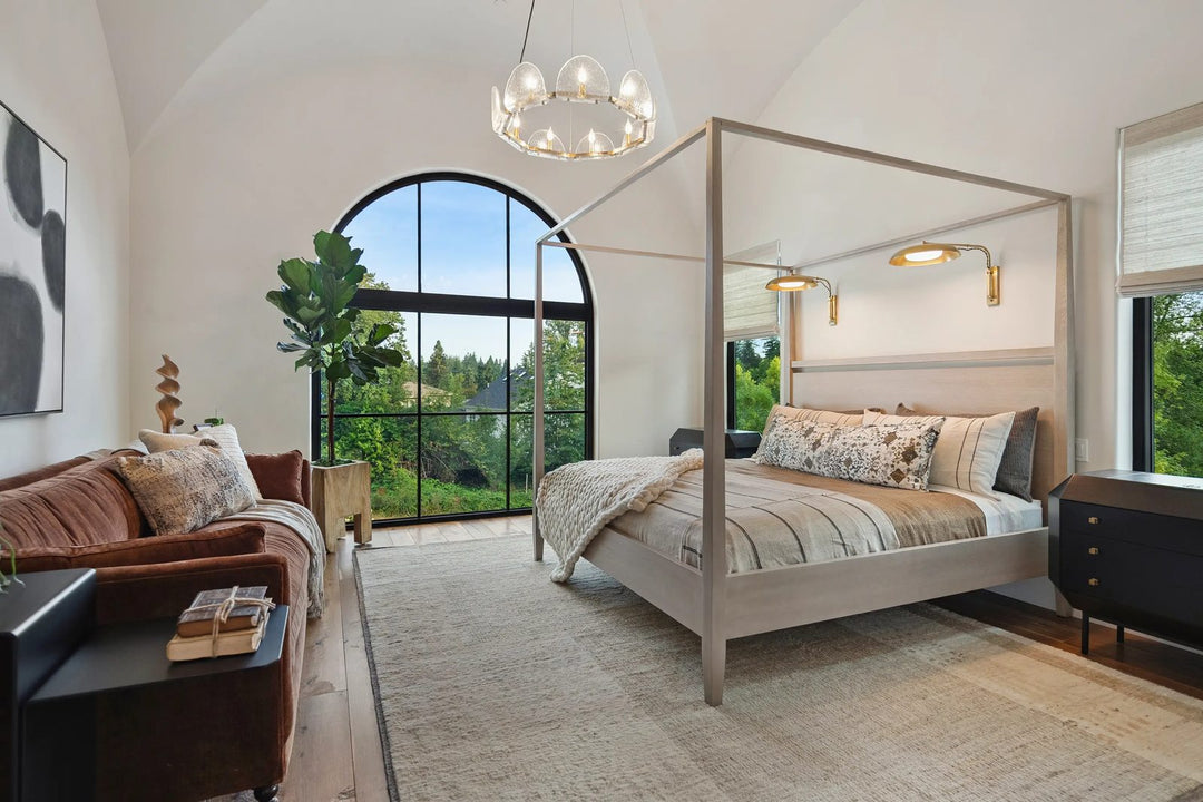 Bedroom suite interior design by What's New Furniture in Lake Oswego Oregon - four poster canopy bed with vaulted ceiling and arched window
