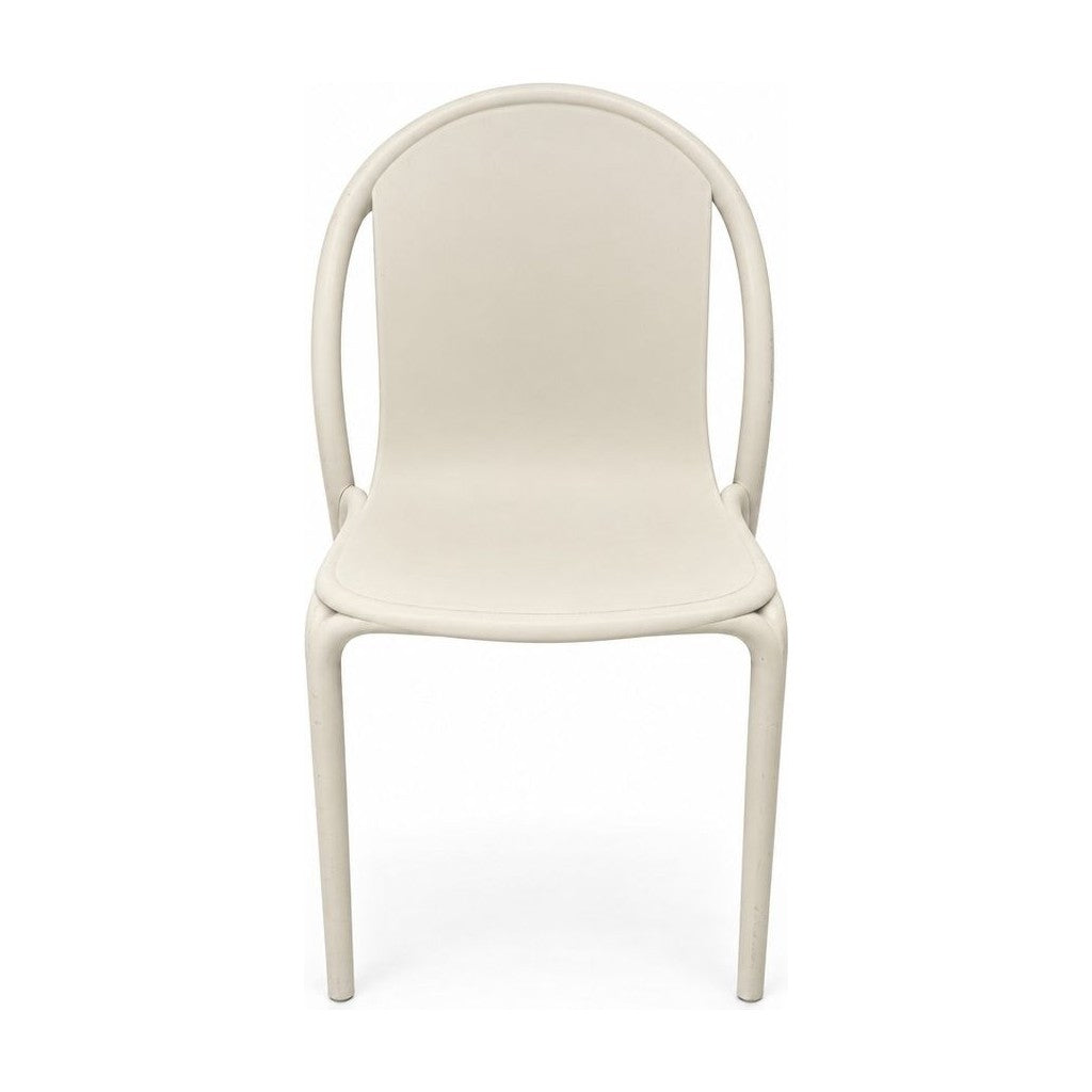 Beige dining chair with a continuous molded shell by Vondom