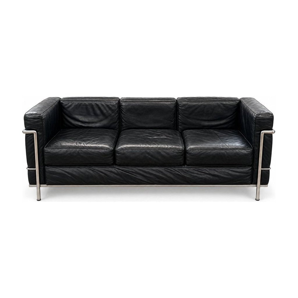 Black leather sofa with cubic cushions and a tubular steel frame - Whats New Furniture Portland OR