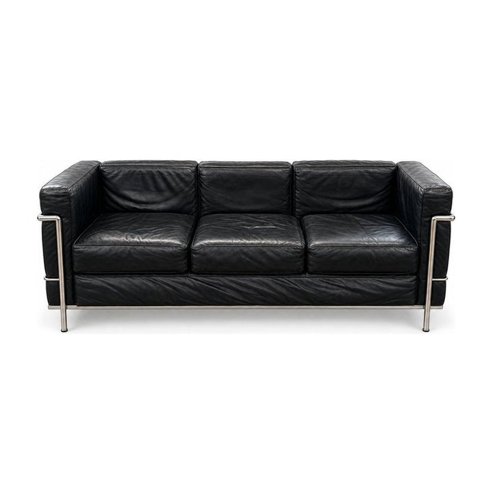 Black leather sofa with cubic cushions and a tubular steel frame - Whats New Furniture Portland OR