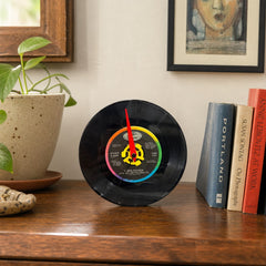 Black Tanya Tucker 7-inch vinyl record clock with analog hands and label graphics. - detail view 1