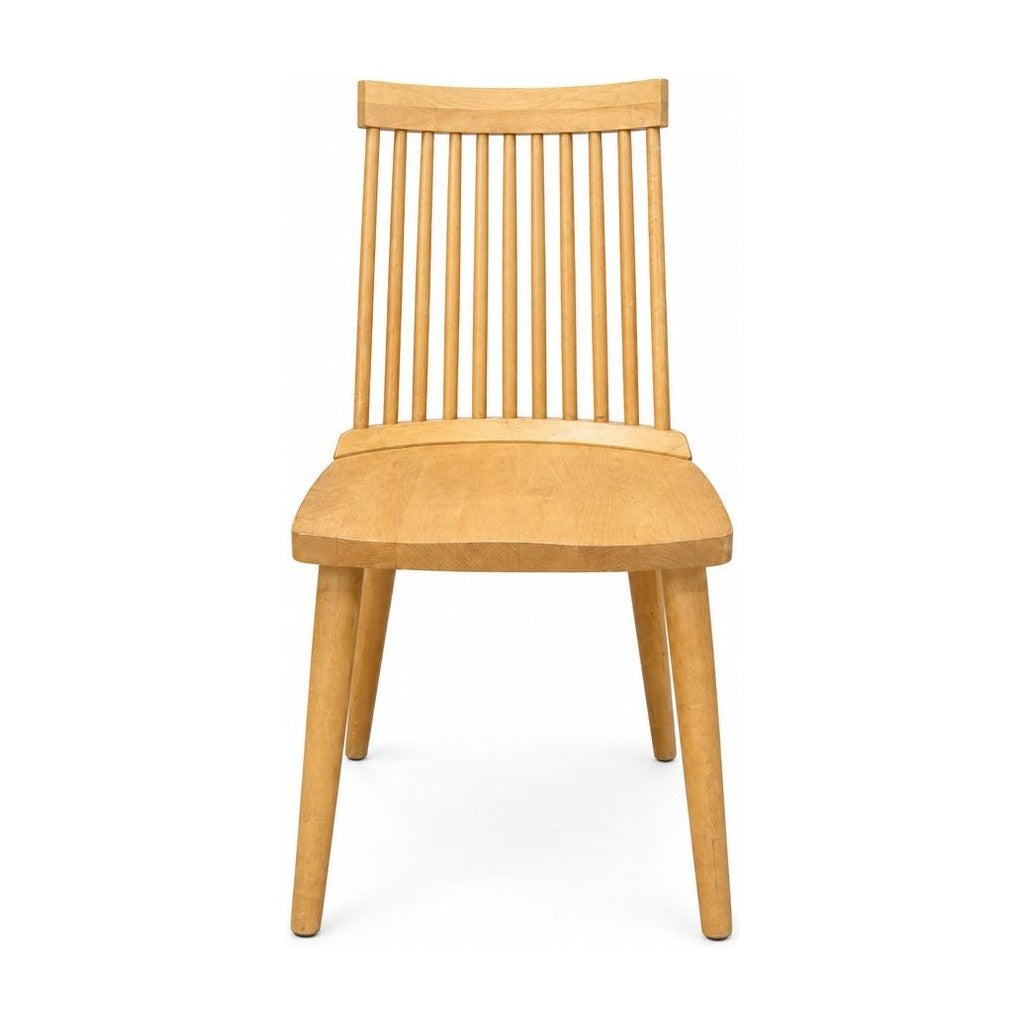 Blonde dining room chairs with tapered wood frames, shown as a set of four.