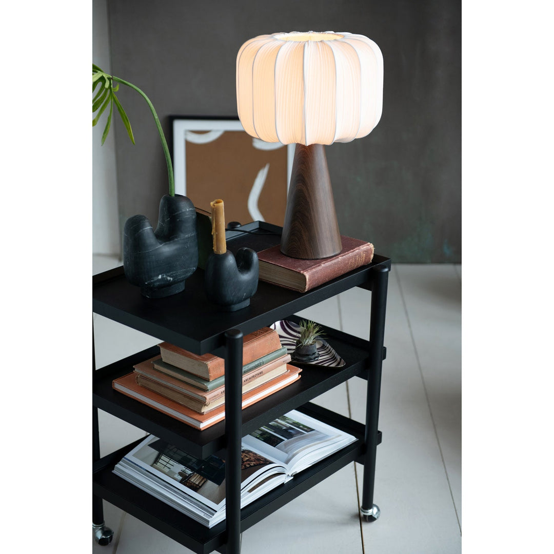 Pleated shade table lamp styled on a black bar cart with books and a fiddle leaf fig in a Portland living room - Whats New Furniture