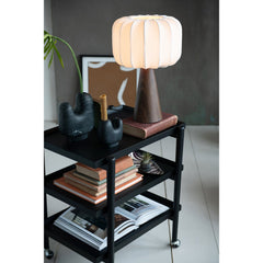Pleated shade table lamp styled on a black bar cart with books and a fiddle leaf fig in a Portland living room - Whats New Furniture