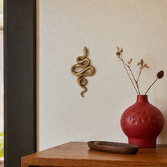 Resin Snake Wall Décor, Gold Finish styled in a Portland living room - Whats New Furniture