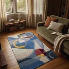 Blue mid-century low-pile accent rug in a small rectangular size - view 2
