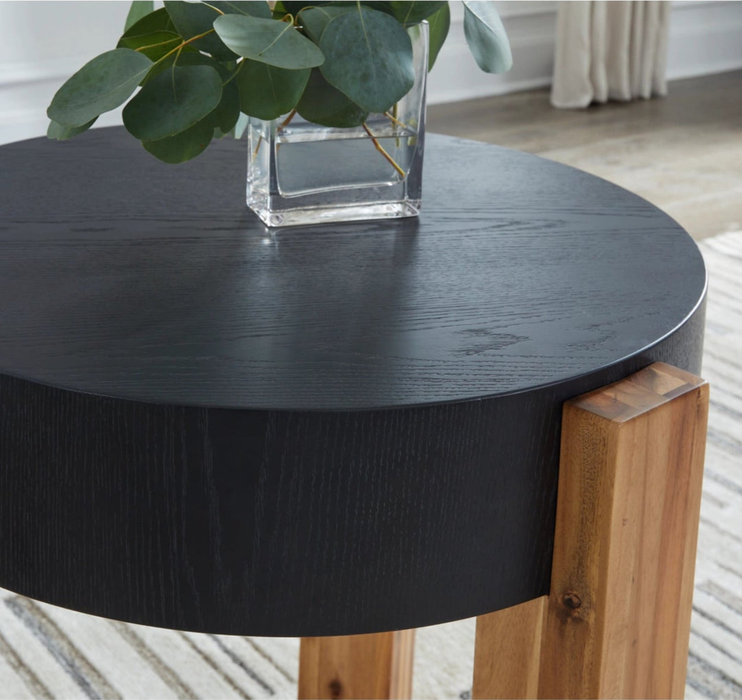 Breenmore Table in Black/Natural detail view - coffee and end table set by Ashley - Whats New Furniture Portland OR
