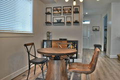 Bronx Bistro Crank Table in Vinegar Matte alternate lifestyle setting - adjustable bistro table by LH Imports - Whats New Furniture Portland OR