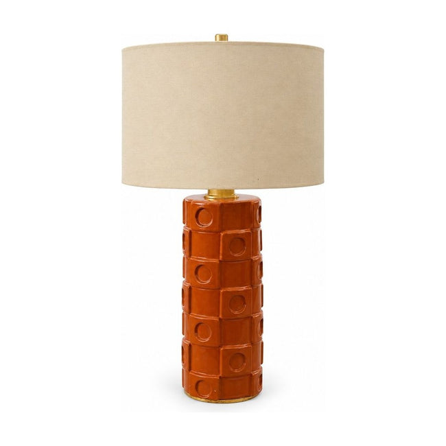 Burnt orange ceramic table lamp with a tapered mid-century body.