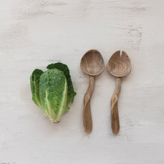 Carved Mango Wood Salad Servers Set of 2 - styled with a fresh salad on the table - Creative Co-Op - What&