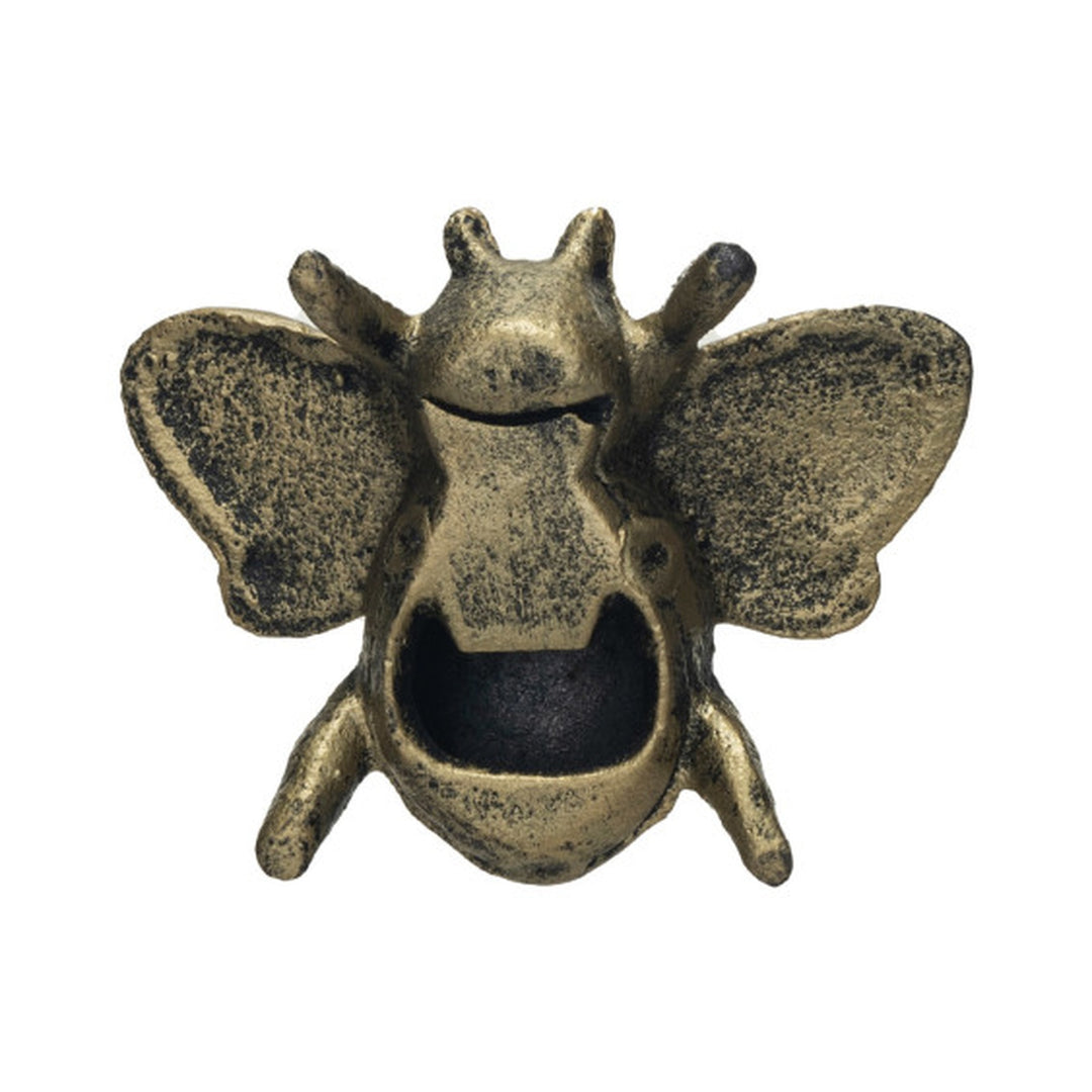 Cast Iron Bee Bottle Opener in distressed gold, reverse view showing the bottle-opener cavity - barware by Creative Co-Op - Whats New Furniture Portland OR