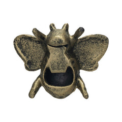 Cast Iron Bee Bottle Opener in distressed gold, reverse view showing the bottle-opener cavity - barware by Creative Co-Op - Whats New Furniture Portland OR