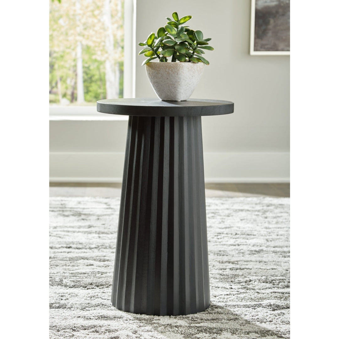 Ceilby Accent Table in Black room setting - black accent table by Ashley - Whats New Furniture Portland OR