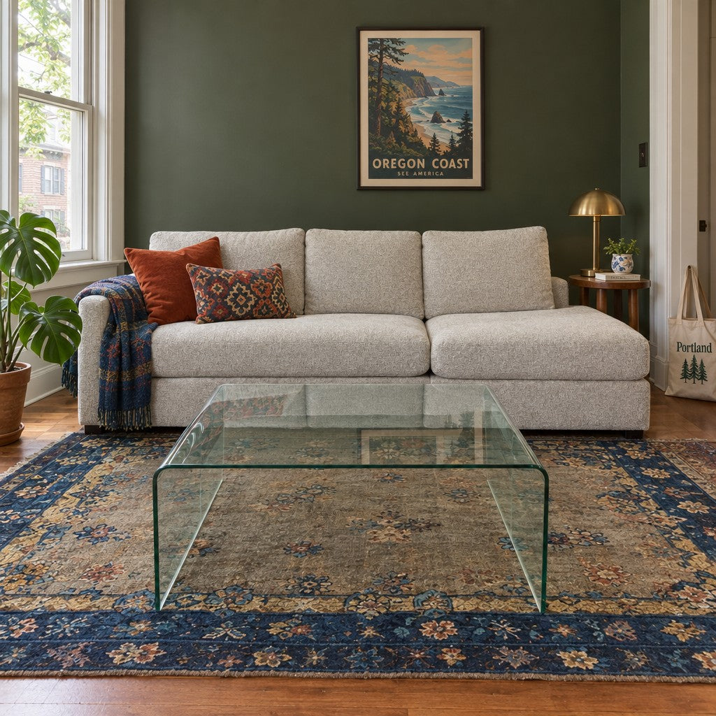 Clear glass coffee table with a low, nearly square top. - detail view 1