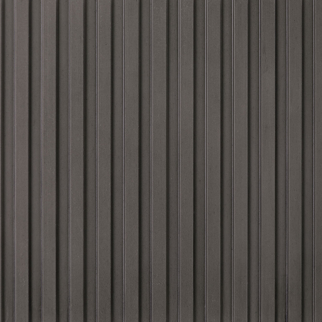 Close-up of the reeded charcoal drum base on the Jason end table
