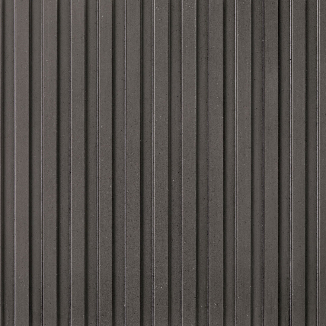 Close-up of the reeded charcoal drum base on the Jason end table