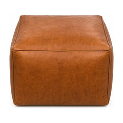 Cognac leather square pouf ottoman with taut cube silhouette and low 15-inch height
