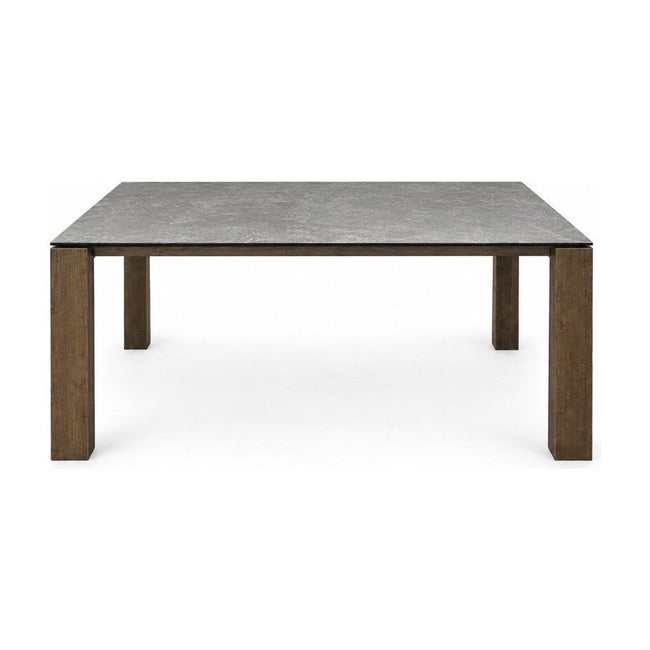 Slate Gray extendable dining table with a ceramic top and smoke wood legs.