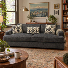 Charcoal gray sofa upholstered in woven Lux fabric by Stanton. - detail view 1